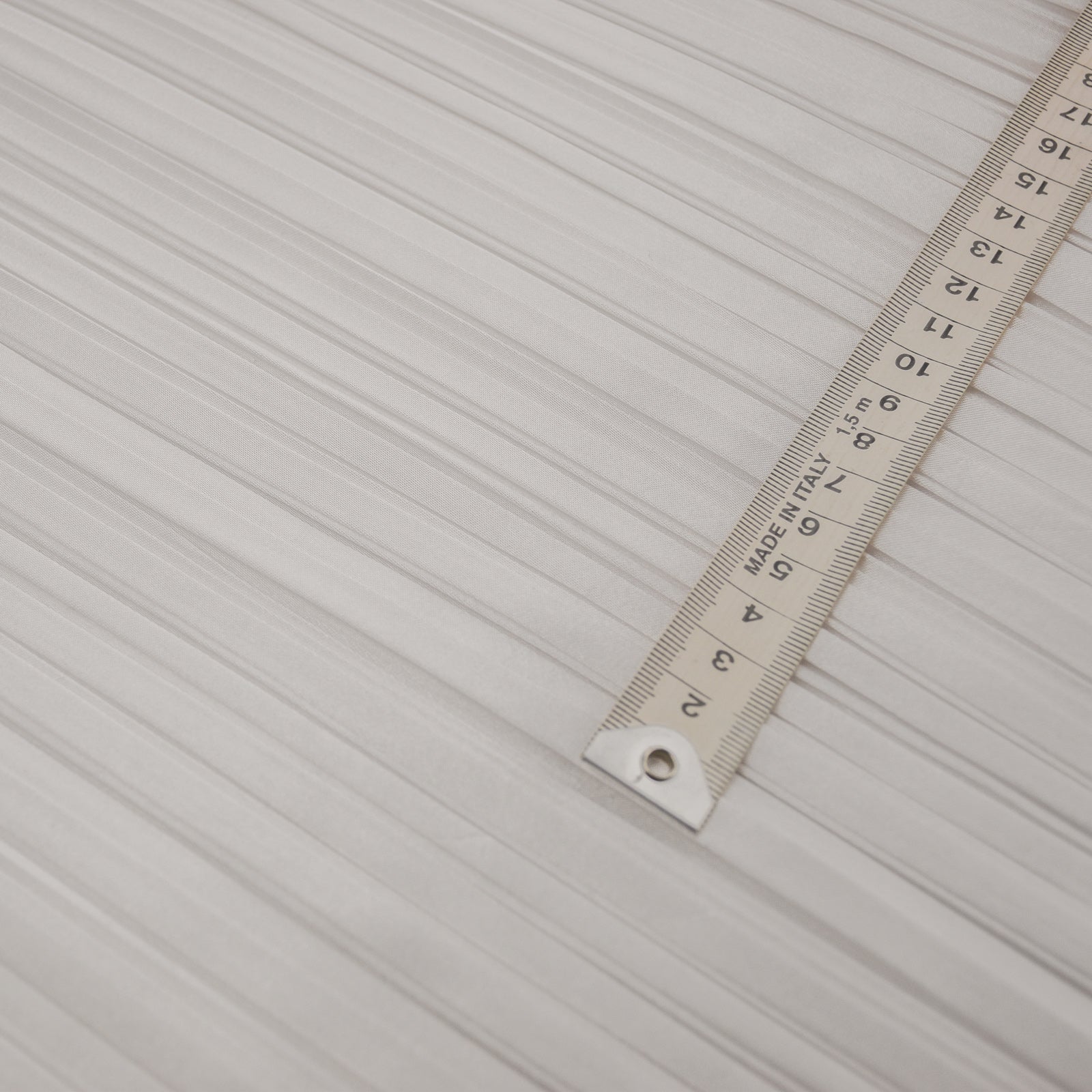 organic fortuny pleating with metric ruler for scale