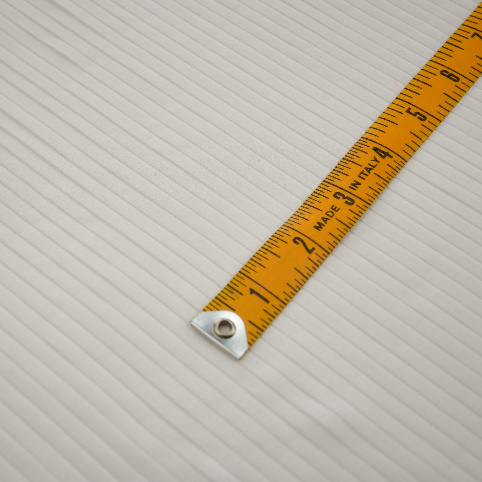 quarter inch side pleating with a imperial ruler for scale