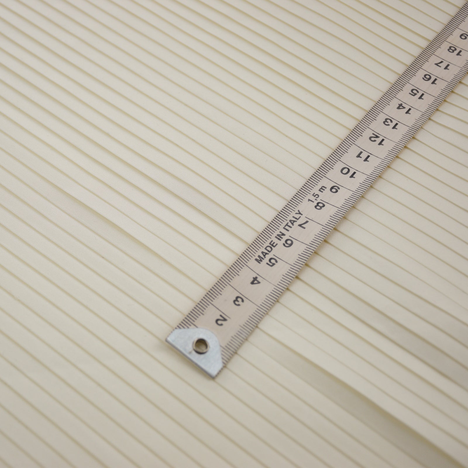 6mm side pleating with metric ruler for scale.